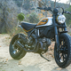 Illustration for article titled This Rad Ducati Scrambler Custom Is What You Get When You Mix Work And Love
